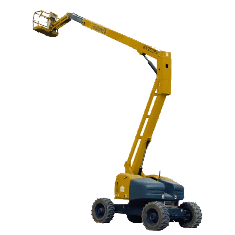 Elevador articulado Haulotte HA260PX con motor diésel y tracción todo terreno, desplegado en entorno de construcción pesada.